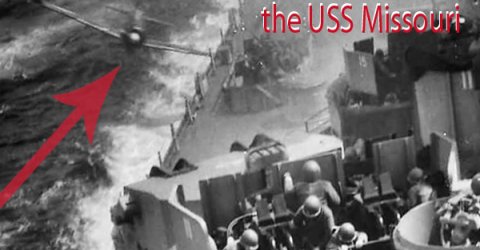 An old black and white picture of Kamikaze Plane about to crash into a battleship of USS Missouri