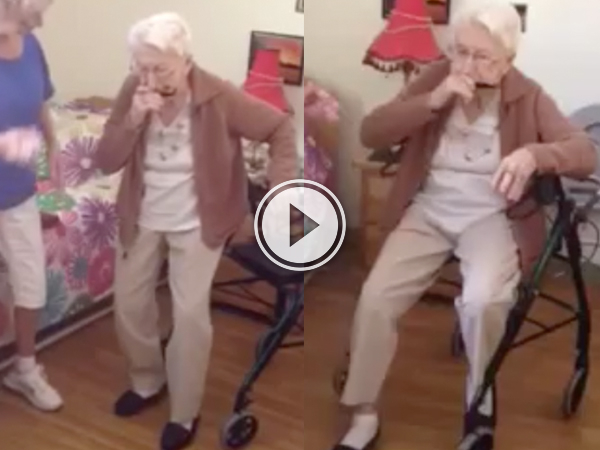 Old grandma playing a mouth organ