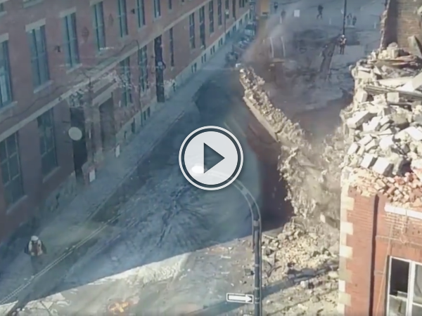 Dude narrowly avoids getting caught under a crumbling wall (Video)