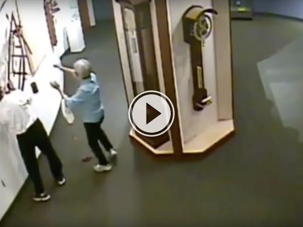 Screenshot of a video with an old man and woman