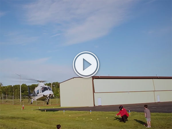 Dad uses Helicopter to pull son's tooth (Video)