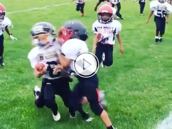 Ouch, kid gets sacked by his own teammate! (Video)