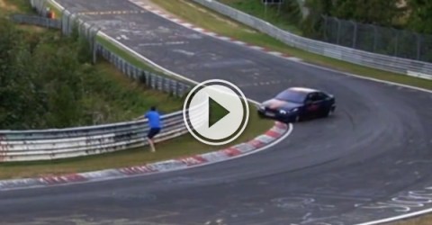 Guy almost gets run over by car (Video)