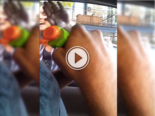 Road rager has a gun pulled on them - a squirt gun! (Video)