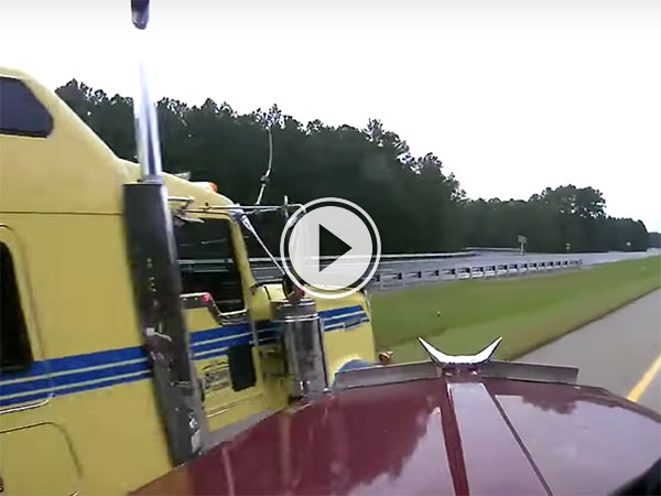 A couple of skilled truckers avoid massive accident (Video)