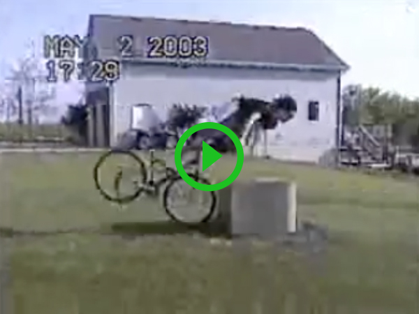 Guy rides full speed into metal box and flys off his bike