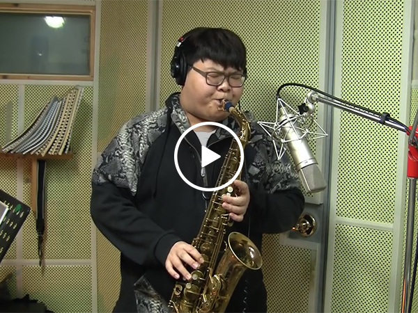 Kid nails Livin' on a Prayer sax cover