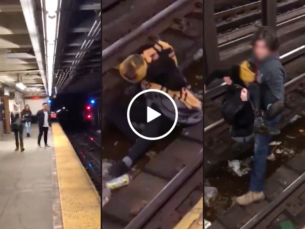 Man saves guy after falling onto subway tracks (Video)