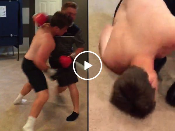 Basement boxing match ends in a wall knock out (Video)