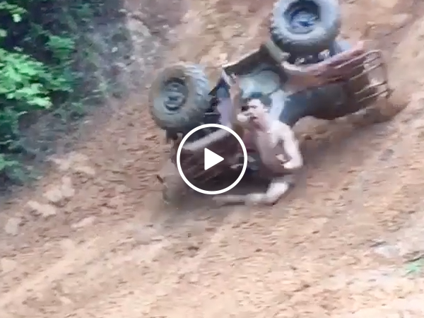 Guy gets rag dolled by ATV (Video)