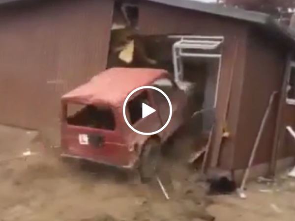 Man destroys house with his car (Video)