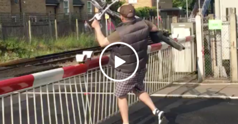 Drunk idiot almost gets hit by car (Video)