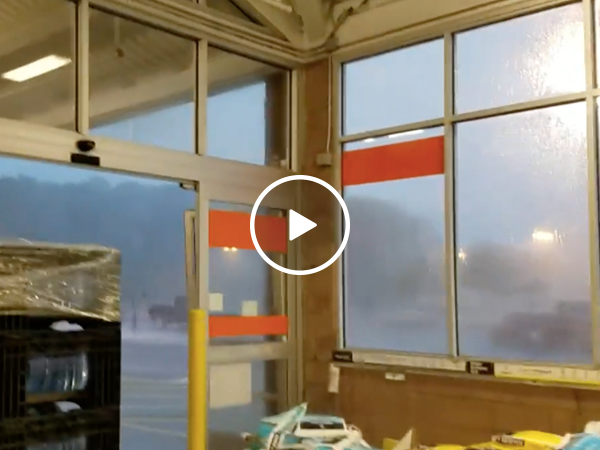 Guy films tornado while uncomfortably close (Video)