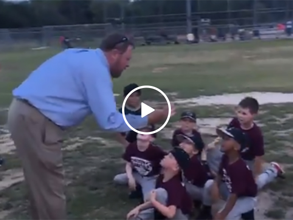 Little league coach gives pep talk