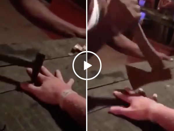 Man endures intense knife game for free shot at Thailand bar (Video)