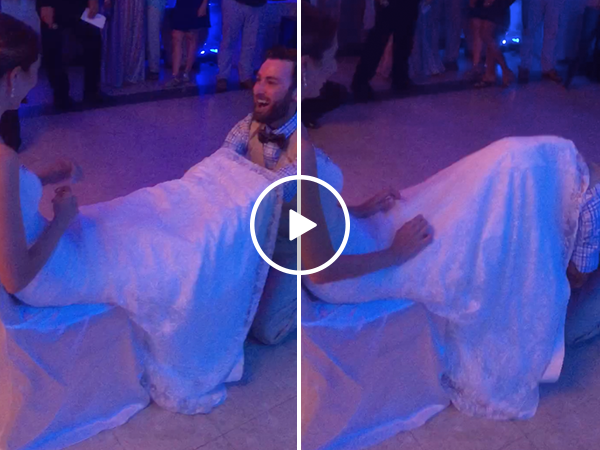 Bride pulls amazing prank on groom during garter toss (Video)