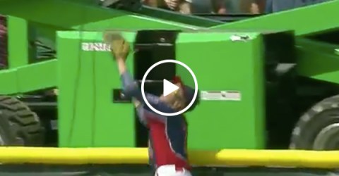 Kid robs home run