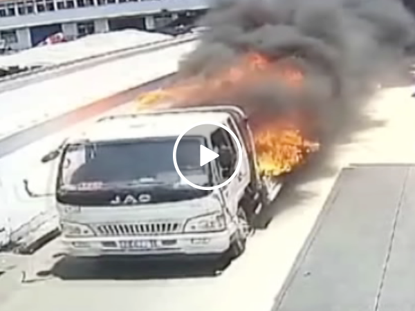 Brave Chinese worker risks life to drive flaming truck away from building (Video)