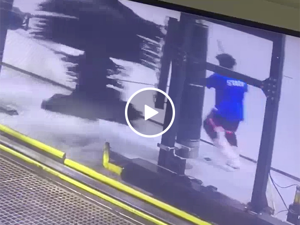 Guy gets caught up in a car wash and gets spun around