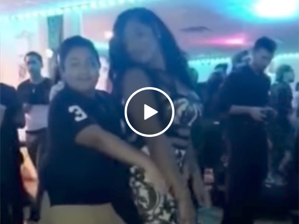 Kid Dancing With Grown Woman