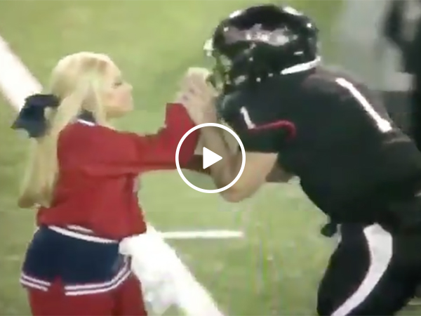 Cheerleader and Football Player Get Into a Fight