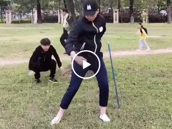 Guy climbs down from tree to expose friend's magic trick