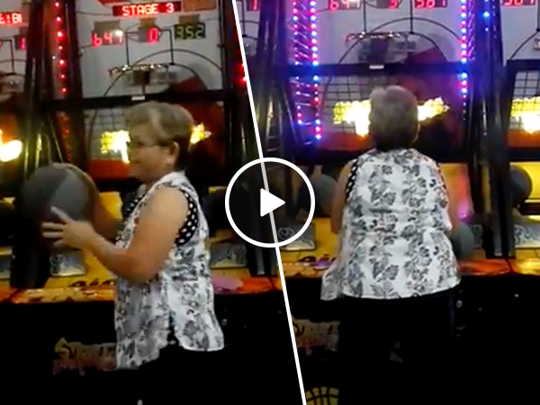 Granny demolishes basketball arcade game (Video)