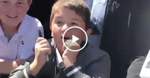 Tiger Woods Signs A Kid's Hat and The Boy Went Nuts With Excitement