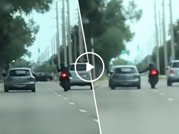 Driver Crashes into Taunting Motorcycle During Road Rage (Video)