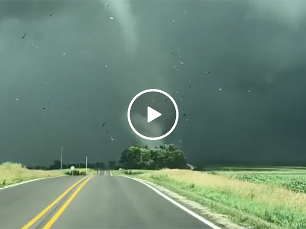 Tornado Rips A Shed Through the Air and Blows Through a Town