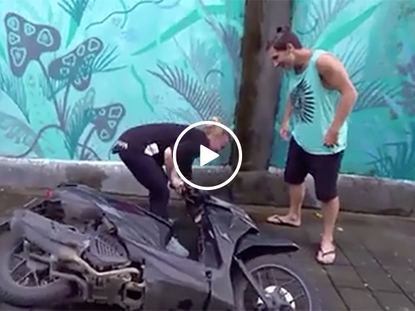Lady Tries to Do Parkour with Motorcycle and Fails Miserably