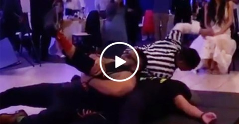 Groom channels The Rock at his WrestleMania wedding?! (VIDEO)