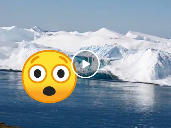 Ever see an iceberg flip over? (Video)